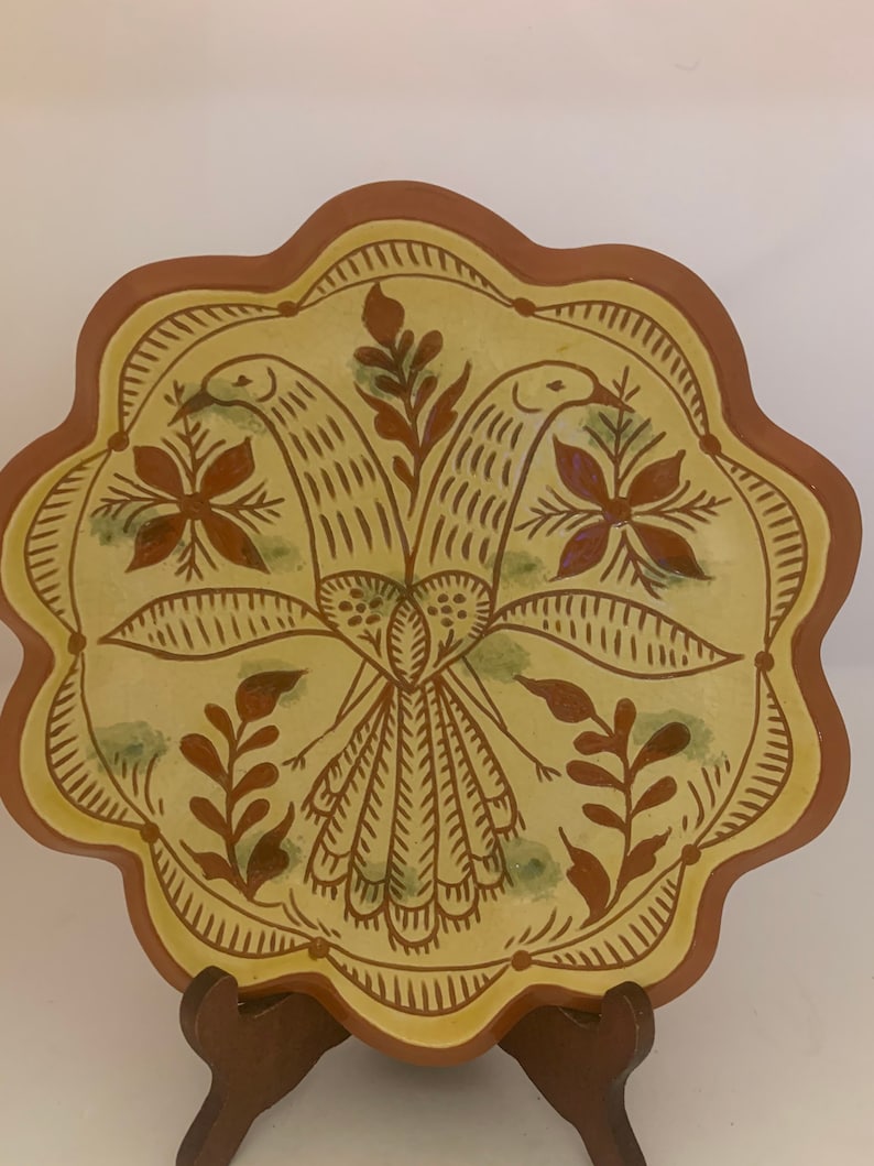 Signed pottery plate glazed bird beautiful