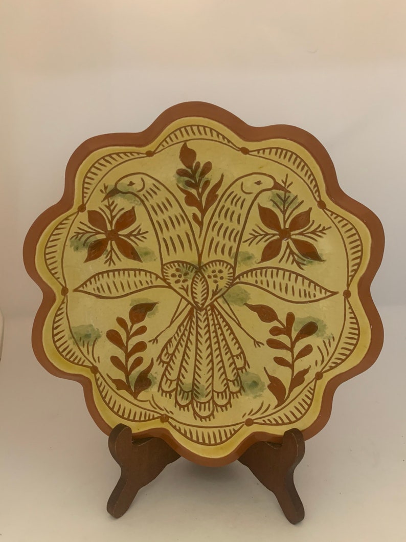 Signed pottery plate glazed bird beautiful
