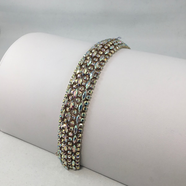 Sherman aurora borealis  rhinestone bracelet 7 row domed  narrow  bracelet   1960s signed  gold plated  back