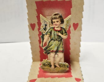 Small Antique Victorian  Diecut Fold-out Cheub Angel Card Germany