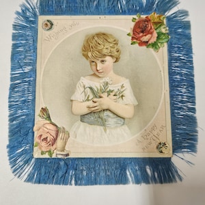 Biglietto d'auguri di felice anno nuovo con frange di seta vittoriana, bambina floreale