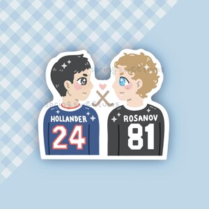 May include: A die-cut sticker featuring two cartoon hockey players facing each other. The left player has dark hair, a blue jersey with HOLLANDER 24, and star accents. The right player has blonde hair, a black jersey with ROSANOV 81, and star accents.