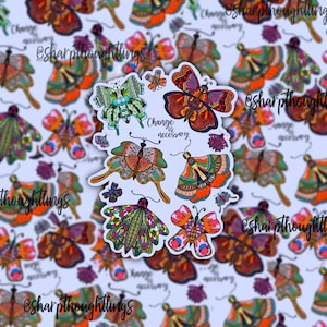 May include: A set of colorful butterfly stickers with intricate designs. The stickers feature a variety of colors, including red, orange, yellow, green, blue, and purple. The stickers are perfect for adding a touch of whimsy to any surface. The text on the sticker reads "Change is necessary."
