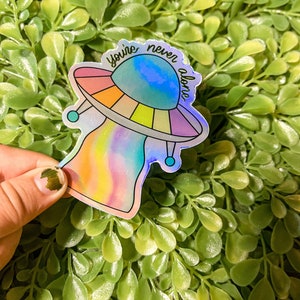 Holographic Rainbow UFO Sticker | You’re Never Alone Sticker | Alien Sticker | Rainbow Space Sticker | Aliens and UFOs | Outer Space