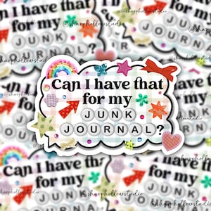 May include: A decorative sticker with the text "Can I have that for my JUNK JOURNAL?" in a playful font. The sticker features a rainbow, stars, a bow, and other embellishments. The background is a checkered pattern.