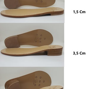 May include: Three pairs of leather sandal soles with different heel heights. The soles are brown and have a textured surface. The heels are made of wood and are brown. The heel heights are 1.5 cm, 3.5 cm, and 5.5 cm.