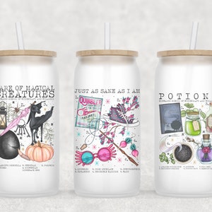 May include: Three white glass tumblers with bamboo lids and straws. Each tumbler features a different design with text and illustrations. One says "Care of Magical Creatures", another "Just as Sane as I Am", and the third "Potions".
