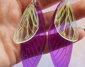 cicada wing dangle earrings > purple and iridescent laser engraved acrylic bug jewelry > fairy wing dangle earrings > handmade by queenbeams