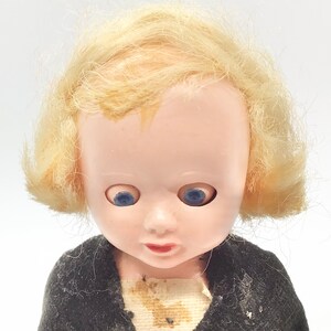 Vintage Small Plastic Creepy Blue Eyed Doll