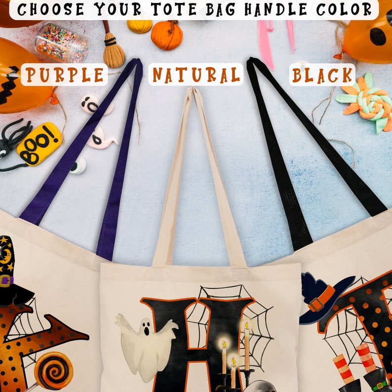 May include: Three tote bags with Halloween designs. The bags are white with black handles. The designs are a witch, a ghost, and a spider web. The handles are available in purple, natural, and black.