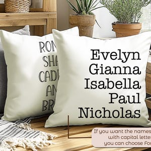 May include: Two white pillowcases with black text. One pillowcase has the names Evelyn, Gianna, Isabella, Paul, and Nicholas. The other pillowcase has the names Ron, Sha, Cadi, An, and Br.