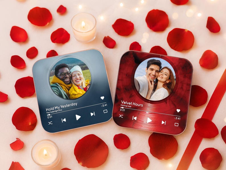 May include: Two square coasters with photos of couples, designed to look like music players, are surrounded by red rose petals and candles. One coaster is blue with the text "Hold My Yesterday". The other is red with the text "Velvet Hours".