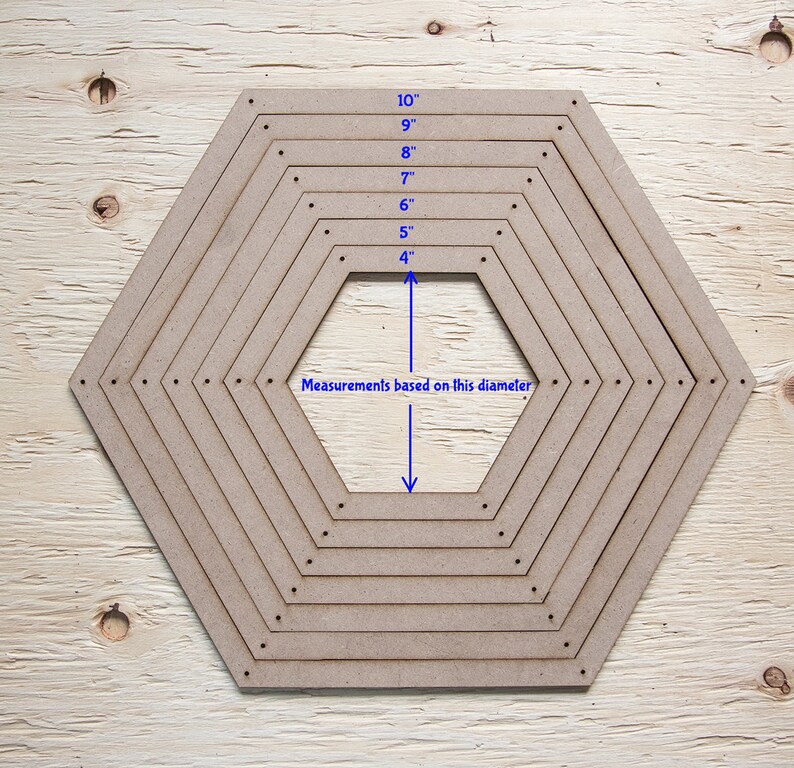 May include: A collection of light brown, hexagonal wooden templates, with sizes from 10 cm to 25 cm in diameter. The sizes are labeled in inches. The text "Measurements based on this diameter" is also present.