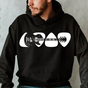 May include: Black hoodie with a white graphic of a guitar made up of three guitar picks.