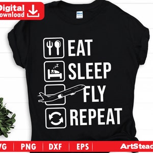 May include: Black t-shirt with white text that reads "Eat Sleep Fly Repeat" with a stylized airplane graphic.