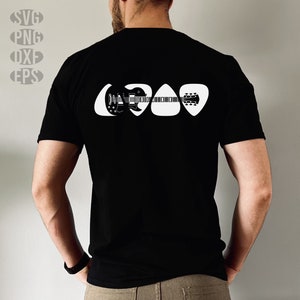 May include: A black t-shirt with a white graphic of a guitar made up of four guitar picks.