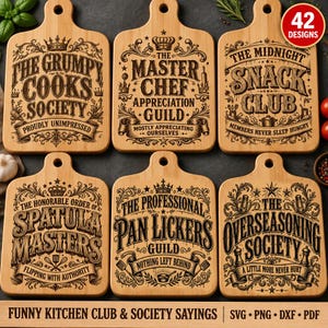 May include: Six light-colored wooden cutting boards with handles, each featuring intricate black engraved text and decorative flourishes. The designs include phrases like The Grumpy Cooks Society, The Master Chef Appreciation Guild, and The Midnight Snack Club.