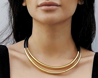 Zwart en goud statement ketting, geometrische slabbetje ketting