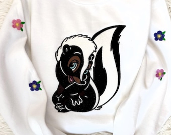 Embroidered Skunk Sweatshirt, Floral Accents, Disney Inspired