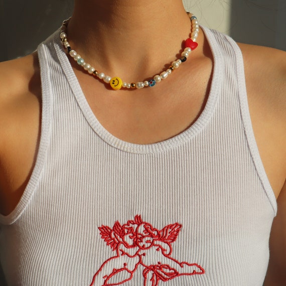 Funky pearl best sale necklace