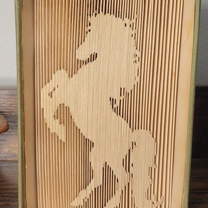 Folded book art, horse, pony, stallion, silhouette,  cowboy, Sifferman Book folding