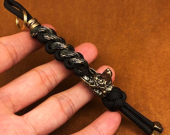 Braided Paracord Knife Lanyard with Brass Wolf Bead