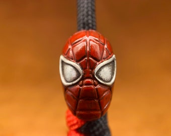 Nuevo diseño de abalorio rojo de Spider-Man, dije para cordón de cuchillo