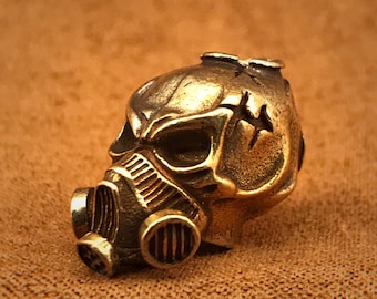 Abalorio de calavera de latón, máscara de gas, cordón para cuchillo EDC