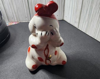 7A.    Vintage  Van Telligen 1950s Peek a Boo single shaker