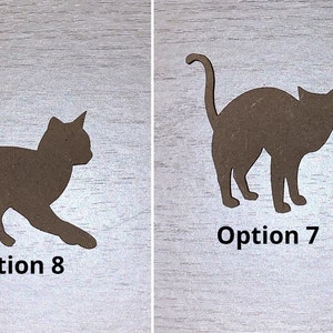 May include: Two brown cat silhouettes, labelled "Option 8" and "Option 7". Option 8 shows a cat in a playful pose, while Option 7 depicts a standing cat. The cat shapes are cut from a light brown material.