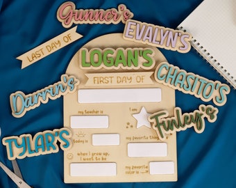May include: A wooden sign with blank spaces for writing, decorated with colorful wooden name tags. The sign says "First Day Of" and "Last Day Of" and includes the names "Gunner's", "Evalyn's", "Logan's", "Chasito's", "Finley's", "Darrin's", and "Tyler's".