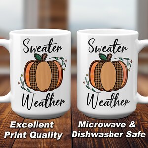 May include: Two white ceramic mugs with a black and orange pumpkin design and the text "Sweater Weather". The mugs are microwave and dishwasher safe.