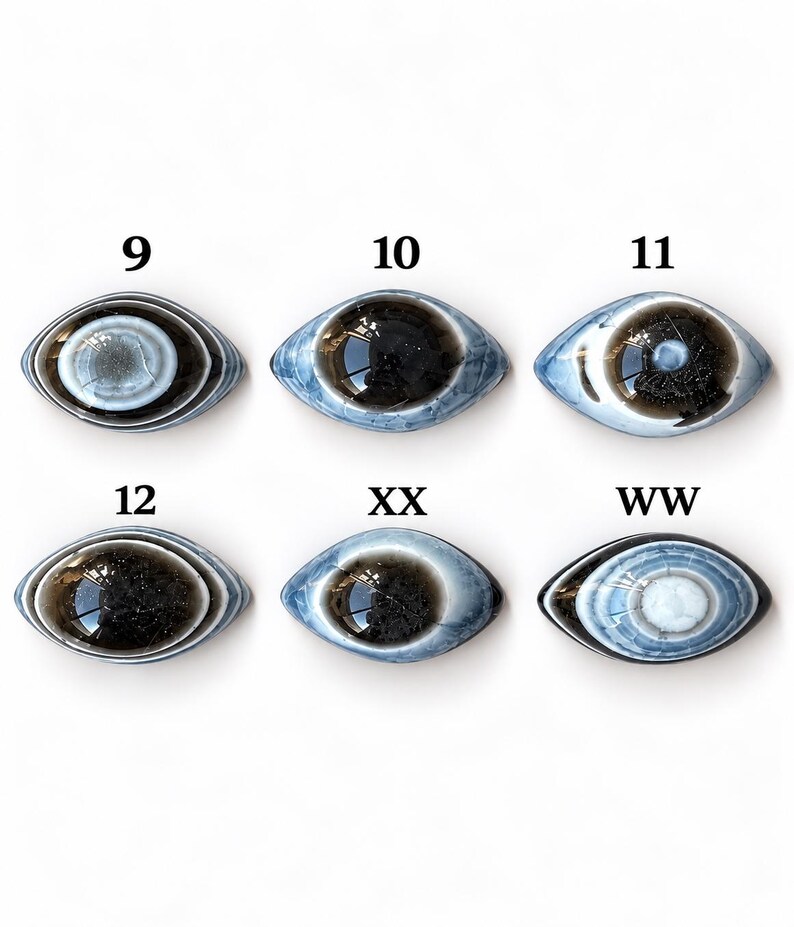 May include: Six oval-shaped cabochons arranged in two rows, each featuring a central dark or light core surrounded by concentric blue and white rings. The items are labelled with the numbers 9, 10, 11, 12, XX, and WW in black text.