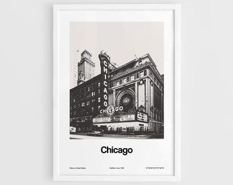 May include: A black and white vintage photograph of a building in Chicago, Illinois. The building has a large sign that reads "Chicago" in bold letters. The building is located in the city's downtown area.