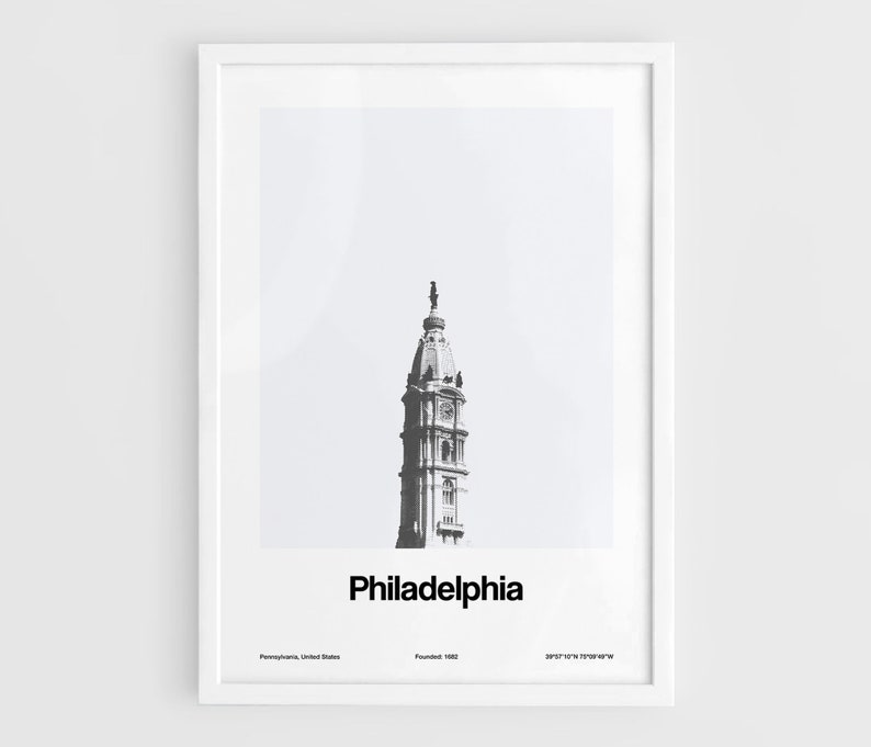 Op de afbeelding: Zwart-witfoto van de toren van het stadhuis van Philadelphia, met de tekst "Philadelphia" onder de afbeelding. De tekst "Pennsylvania, Verenigde Staten" en "Gesticht 1682" staat onderaan de afbeelding.