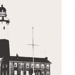 May include: A black and white image of a lighthouse with a tall tower and a smaller building attached. The lighthouse has a flagpole with a flag on top. The building has multiple windows.