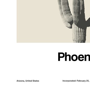 May include: A black and white illustration of a saguaro cactus with the text "Phoenix, Arizona, United States" and "Incorporated: February 25, 1888" below.
