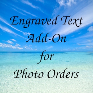 May include: Engraved Text Add-On for Photo Orders. A blue sky with white clouds over a turquoise ocean.