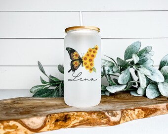 Personalized 16oz sunflower butterfly frosted beer can glass with bamboo topper and plastic straw. Custom gift idea with name. Feminine cup
