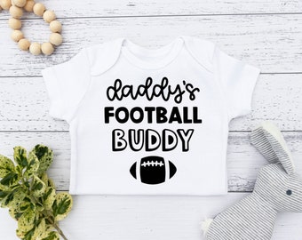 Daddy's football buddy baby bodysuit, Funny dad sports gift, Pregnancy announcement, Infant surprise, Baby shower gift, Sports fanatic gift