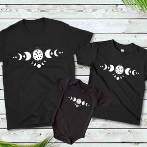 Moon phase shirts and bodysuits to match. Matching family gothic esthetic for all sizes. Unisex sizing apparel for friends and family. Cute.