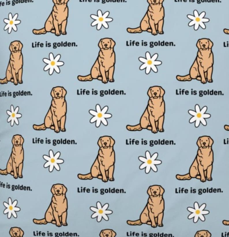 May include: A seamless pattern featuring a light blue background with repeated images of golden retrievers sitting and white daisies. The text "Life is golden." is repeated throughout the pattern.