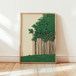 May include: A framed print depicting a bamboo forest. The artwork shows tall, slender bamboo stalks with green foliage at the top. The foreground has a green grassy area, and the background is a light beige colour.