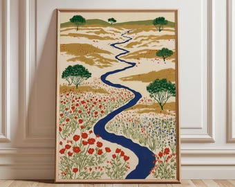 May include: A framed vertical art print featuring a winding dark blue river flowing through a landscape of tan rolling hills, scattered green trees, and a foreground filled with vibrant red poppies and small blue wildflowers on a cream background.