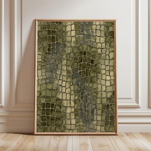 Peut inclure: Une impression d'art mural rectangulaire présentant un motif répétitif de formes irrégulières en blocs dans diverses nuances de vert olive, sauge et vert forêt foncé, encadrée dans un cadre en bois clair simple au profil plat et épuré.