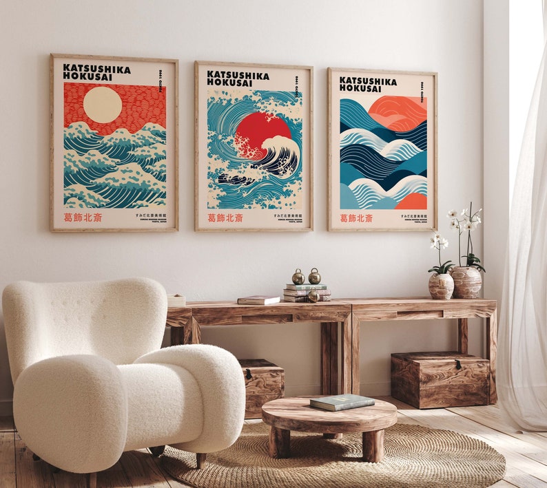May include: Three framed prints of Japanese woodblock prints depicting waves and a red sun. The prints are titled "Katsushika Hokusai" and "葛飾北斎".