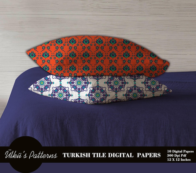 May include: Two decorative pillows with Turkish tile patterns. One pillow has an orange background with teal and green floral designs. The other pillow has a white background with purple, teal, and green floral designs. The pillows are 12 x 12 inches.