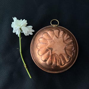 Pequeño molde de cobre con forma de estrella sueca