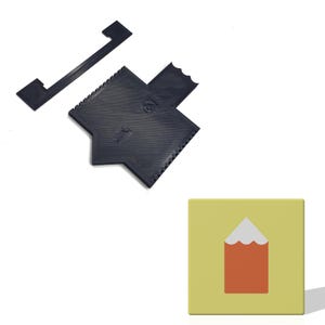 May include: Black 3D-printed plastic tools, including a notched, star-shaped piece with the number "1" and "2" and a rectangular piece. A yellow square with a red and white pencil icon is in the lower right corner.