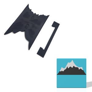 May include: Black plastic tool with a jagged edge and a separate, rectangular piece. The tool has the number "2" printed on it. A small, square, blue block with a mountain graphic is in the lower right corner.
